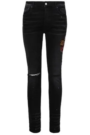 AMIRI Skinny Jeans mit Vintage-Aufnäher