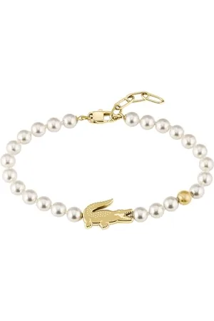 Lacoste Faux-Perlenkette, Armband und Ohrringe Für Männer und Frauen Kollektion MATCHPOINT mit verschiedenen Charms in Gelbgoldfarb