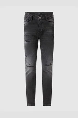 ER ELIAS RUMELIS Tapered Jeans aus Baumwoll-Mix im Used Look