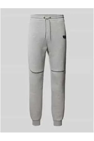 Review Tapered Fit Sweatpants mit Label-Print