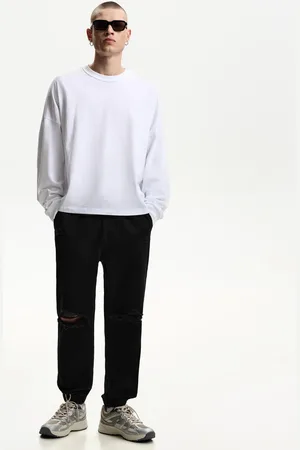 Bershka Jogger-Jeans Mit Zierrissen Herren Xs Schwarz