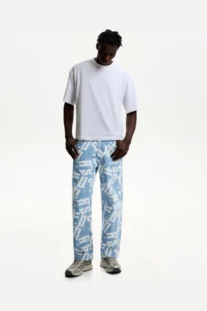 Bershka Baggy-Jeans Mit Print Herren 34 Hellblau