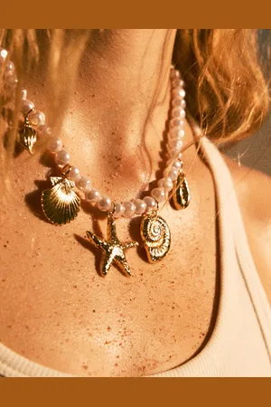 Bershka Halskette Mit Perlen Und Seesternprint Signature Edition Damen Gold