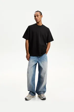 Bershka Super-Baggy-Jeans Herren 32 Ausgewaschenes Blau