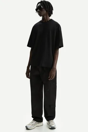 Bershka Wide-Leg-Hose Mit Mehreren Cargotaschen Herren Xs Schwarz