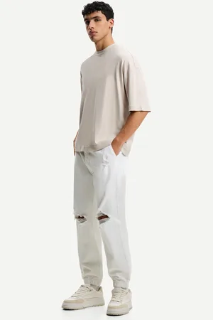 Bershka Jogger-Jeans Mit Zierrissen Herren Xs Weiss