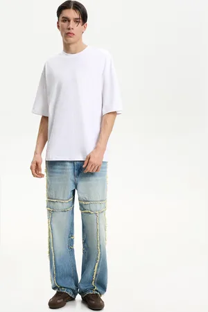 Bershka Baggy-Jeans Fransen Herren 32 Ausgewaschenes Blau