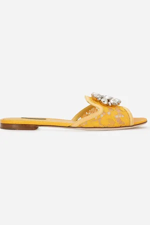 Dolce & Gabbana Slipper aus Spitze mit Kristallen