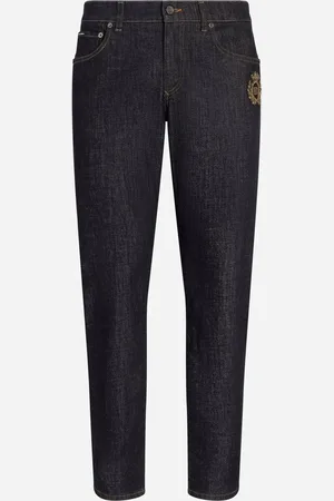 Dolce & Gabbana Jeans Slim aus Baumwollstretch mit Patch