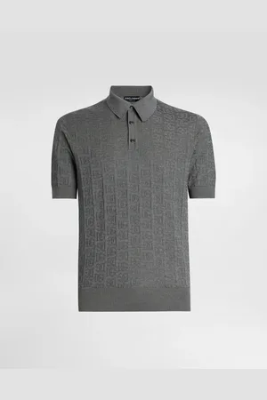 Dolce & Gabbana Poloshirt aus Seide mit DG-Logostickerei allover