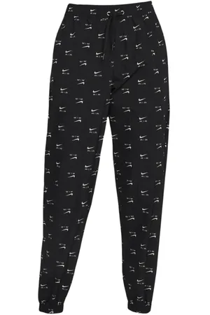 Nike All-Over Logo Schwarze, dunne Trainingshose