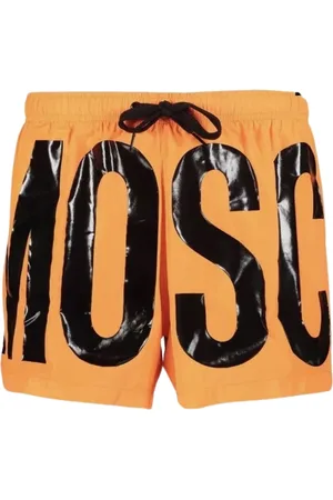 Moschino Hellorangefarbene kurze Badeshorts mit Printlogo der Marke