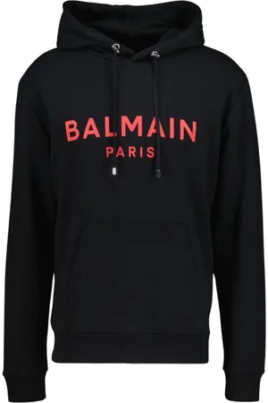 Balmain Paris trug klassisches Hemd mit schwarzer Kapuze und Logo