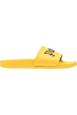 Palm Angels Gelbe Pool-Slides mit Gothic-Print von
