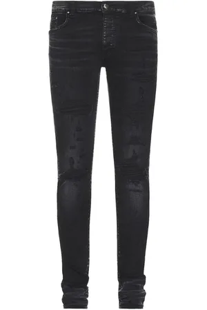 AMIRI Slim Fit Thrasher Plus Jeans aus gealtertem schwarzem Denim