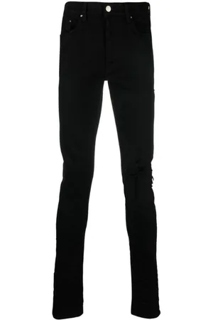 AMIRI Slim Fit Denim-Jeans mit kaputten Rissen und Rissen in