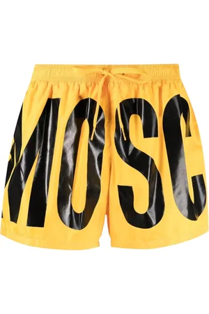 Moschino Kurze Badeshorts von in Schwarz mit kräftigem Logo-Print in leuchtendem