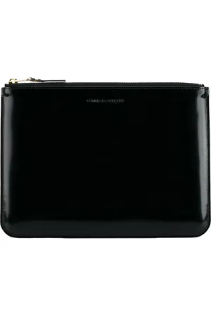Comme des Garçons Clutch mit Logo-Prägung