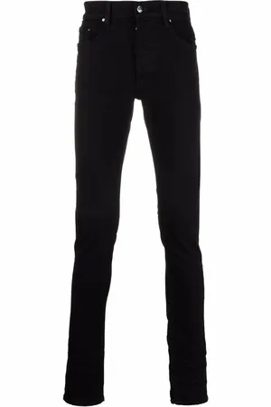 AMIRI Skinny-Jeans mit Logo-Schild