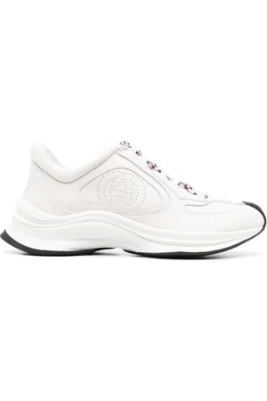 Gucci Sneakers mit perforiertem Logo