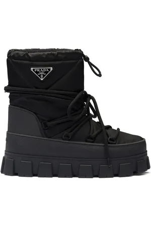 Prada Schneestiefel mit Logo-Schild