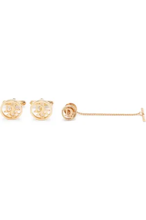 Dior 1990 Set aus Brosche und Manschettenknöpfen mit Logo
