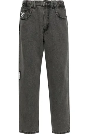 A Bathing Ape Weite Jeans mit Logo-Applikation