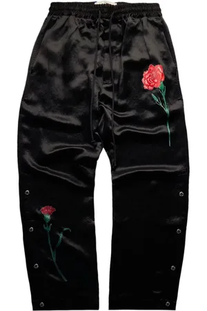SONG FOR THE MUTE Satin-Jogginghose mit Blumenapplikation
