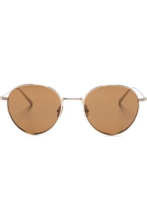 Totême Runde Sonnenbrille mit Logo-Gravur