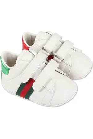 Gucci Lauflernschuhe mit Signaturen