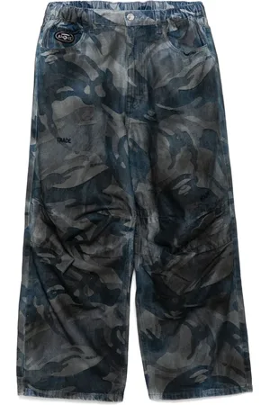 A Bathing Ape Ausgeblichene Camo-Jeans mit Moonface-Logo