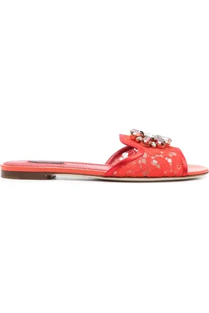 Dolce & Gabbana Pantoletten aus Spitze mit Brosche