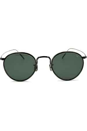Eyevan 7285 Sonnenbrille mit rundem Gestell