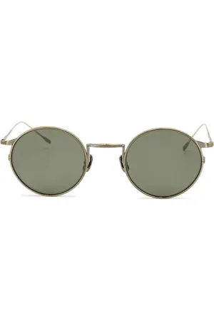 Eyevan 7285 Sonnenbrille mit rundem Gestell