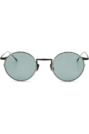 Eyevan 7285 Sonnenbrille mit rundem Gestell