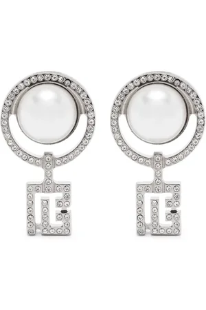 Balmain ^ Silberfarben^ poliertes Finish^ Clip-on-Design^ weißen Kristallen im Rundschliff^ Diese Ohrringe werden als Paar geliefert.