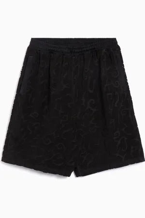 PUMA X ARIES Regular Herren- Shorts
