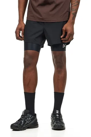 District Vision Layered Pocketed Trail Shorts