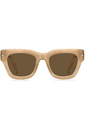 HUGO BOSS Sonnenbrille aus beigem Acetat mit charakteristischen goldfarbenen Details