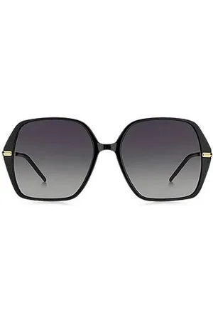 HUGO BOSS Sonnenbrille aus schwarzem Acetat mit goldfarbenen Bügeln