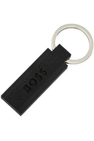 HUGO BOSS Schlüsselanhänger aus schwarzem Silikon und Messing mit Logo