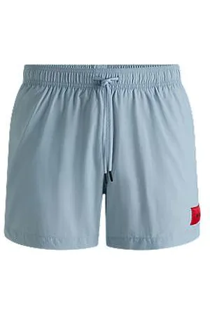 HUGO BOSS Badeshorts mit durchgehendem Innenfutter und rotem Logo-Label