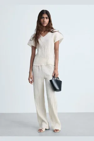MANGO Top mit V-Ausschnitt und Knitter-Effekt - Damen - S