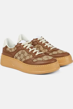 Gucci Sneakers GG aus Canvas und Leder