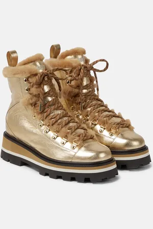 Jimmy Choo Schnürstiefel Chike aus Metallic-Leder mit Shearling