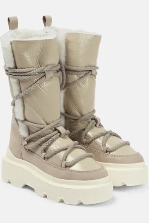 INUIKII Schneestiefel aus Leder mit Shearling