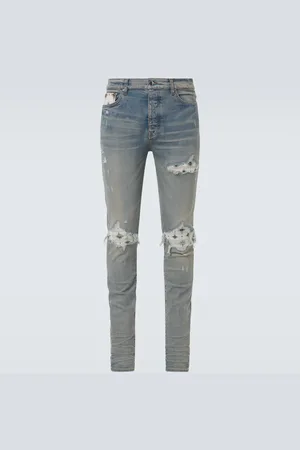 AMIRI Distressed Skinny Jeans Micro Starburst