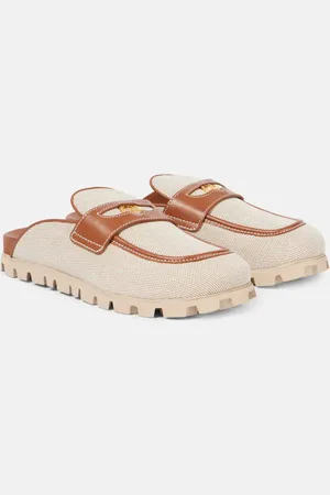 Miu Miu Slippers aus Canvas mit Leder