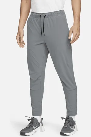 Nike Unlimited vielseitige Dri-FIT Hose mit Reißverschluss am Bündchen für Herren