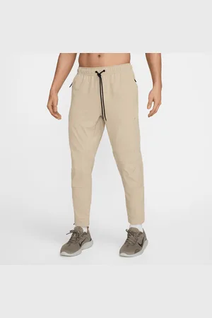Nike Unlimited vielseitige Dri-FIT Hose mit Reißverschluss am Bündchen für Herren